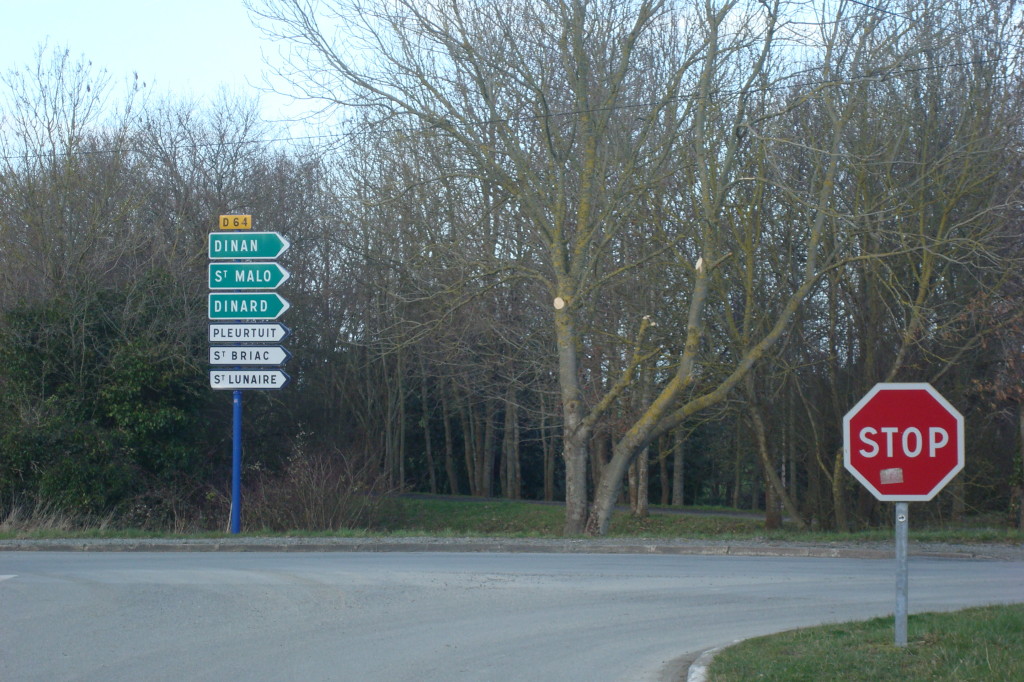 Take the exit road from the airport and at the first junction turn right onto the D64