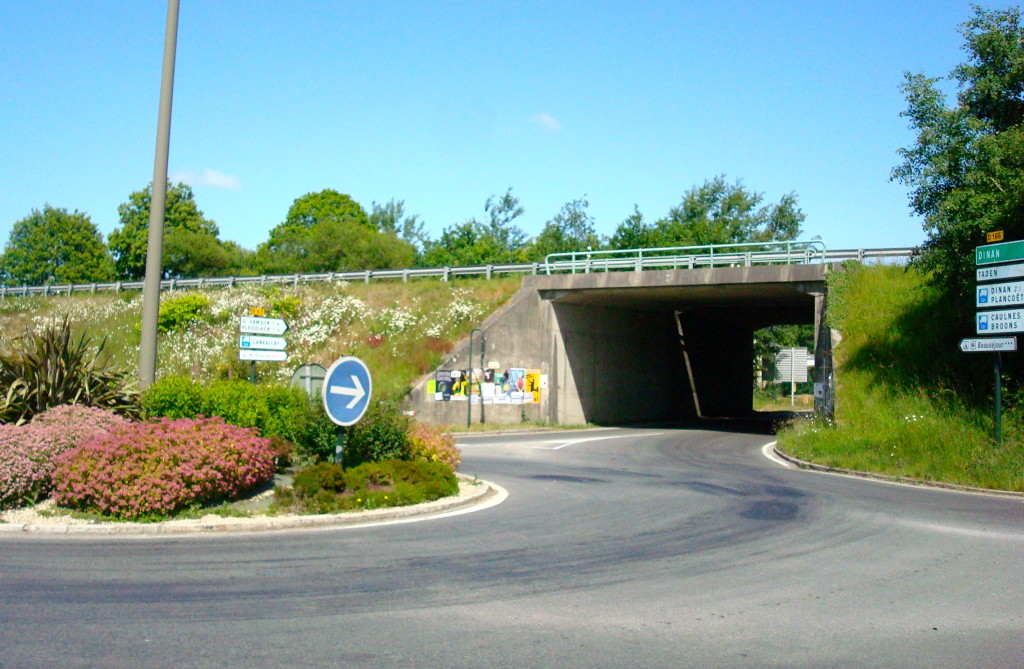 At the roundabout take the third exit under the bridge